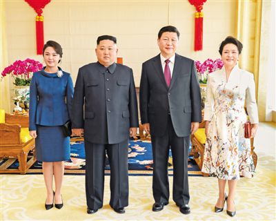 习近平同朝鲜劳动党委员长金正恩举行会谈